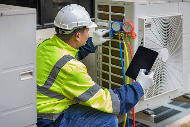 Professional Heat Pump Repair technician working in Parsons, TN